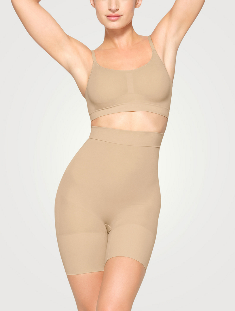 Buy Brown Check Shapewear Slim Trousers from Next Canada