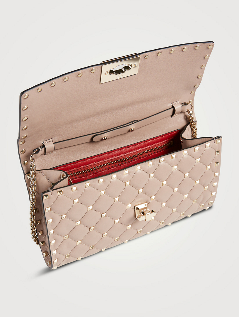 ROCKSTUD SPIKE NAPPA LEATHER CROSSBODY CLUTCH BAG