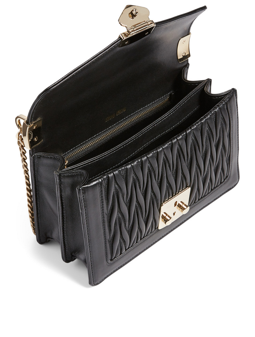 Matelassé leather clutch bag Miu Miu Black in Leather - 40049694