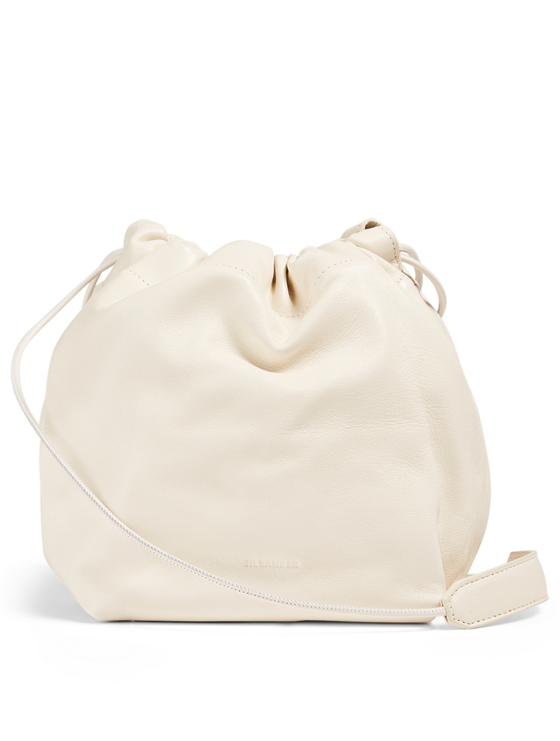 Drawstring crossbody sale bag