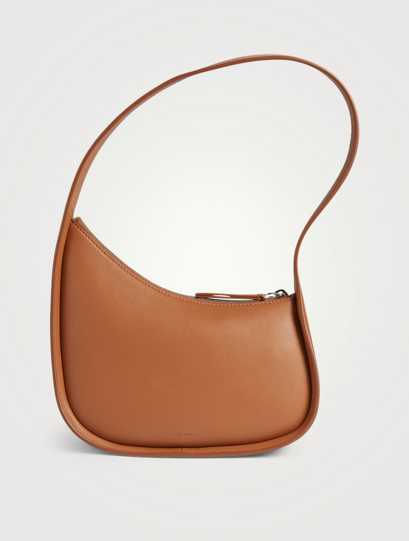 THE ROW Half Moon Leather Shoulder Bag | Holt Renfrew