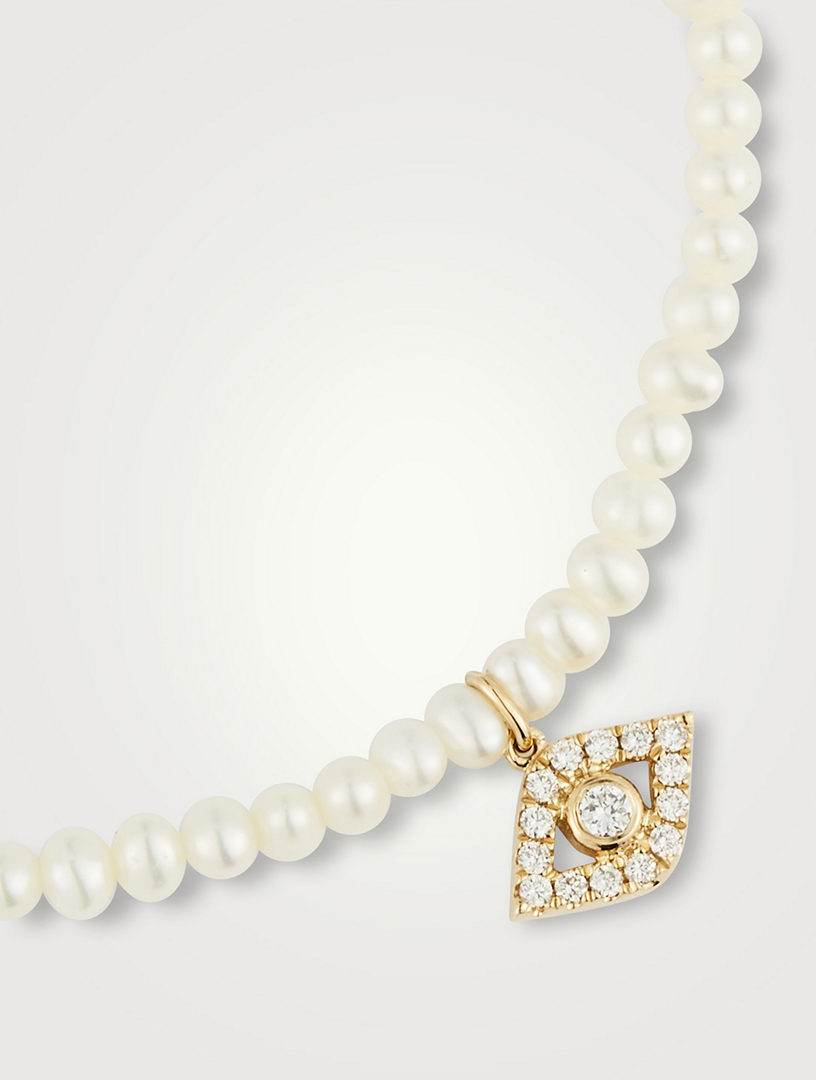 Pearl Bracelet With Large 14K Gold Diamond Evil Eye Charm