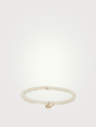 Bracelet de perles avec petite breloque baleine en or 14 ct avec diamants