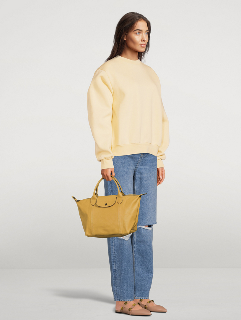 Le pliage cuir top handle online bag