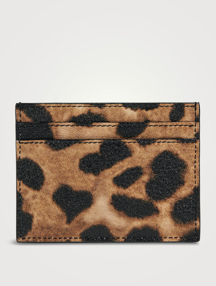 Saint Laurent Paris FRAGMENTS zip card case in leopard-print