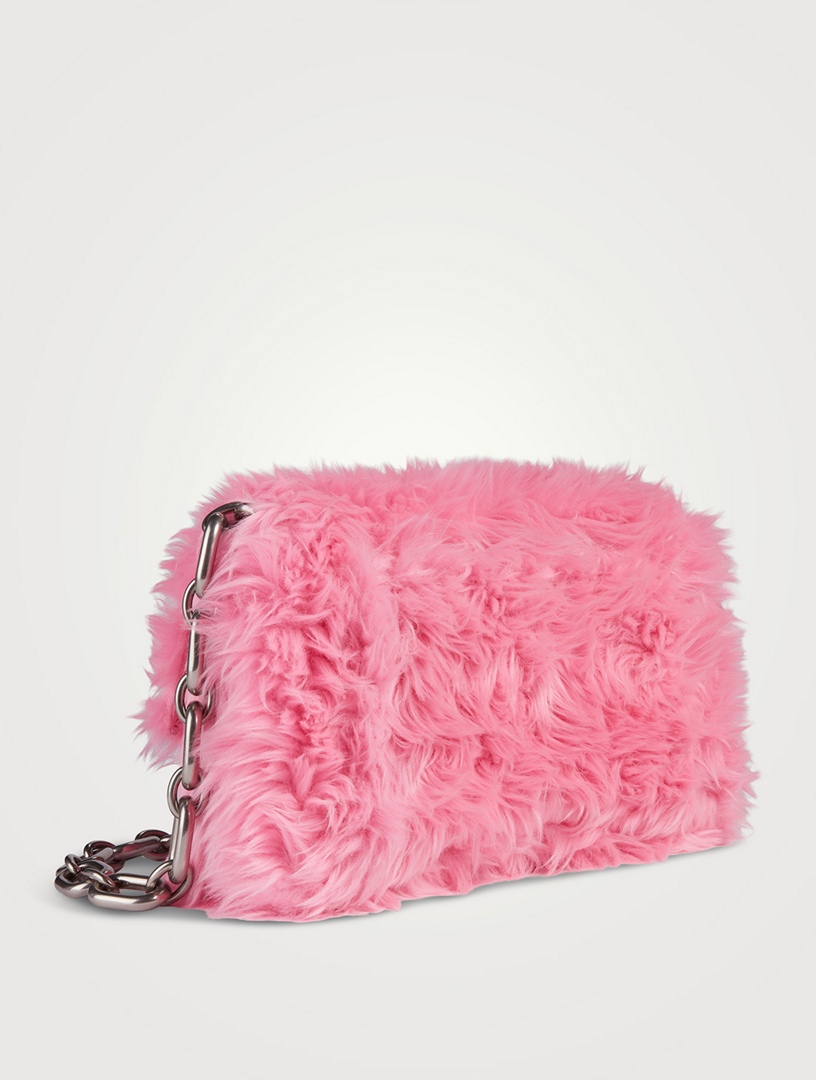 Balenciaga discount fur clutch