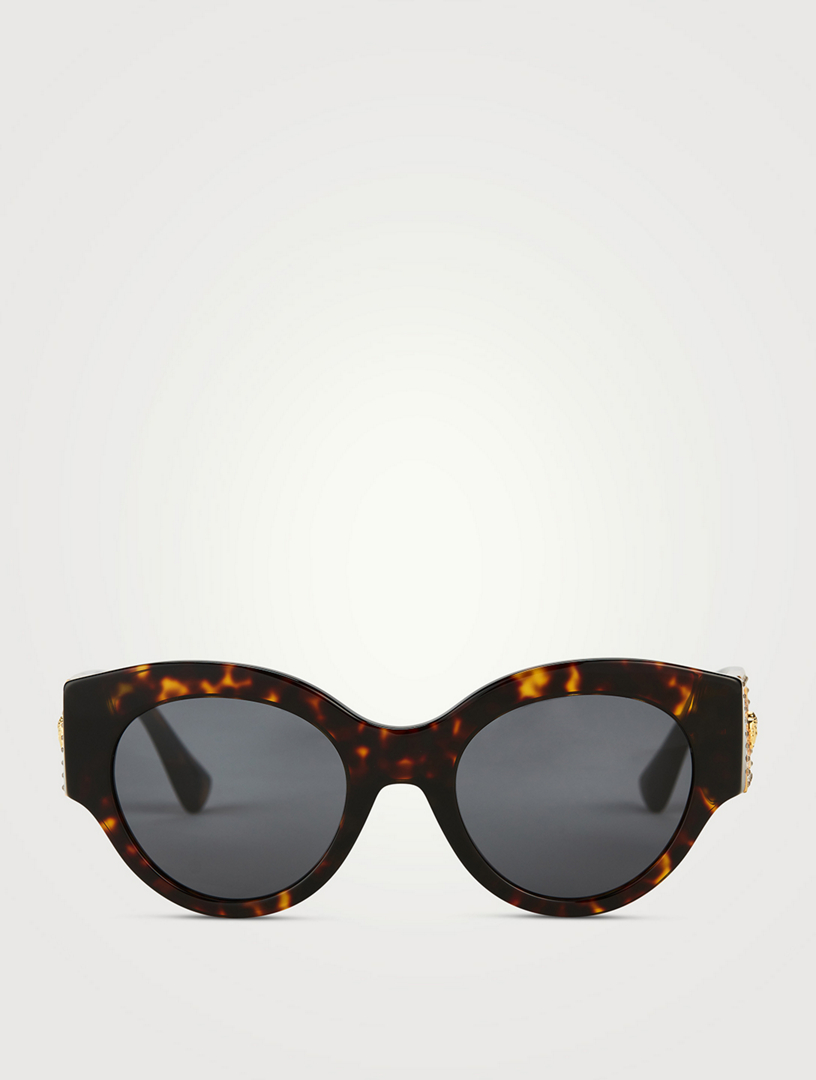 Embellished cat-eye sunglasses in black - Versace