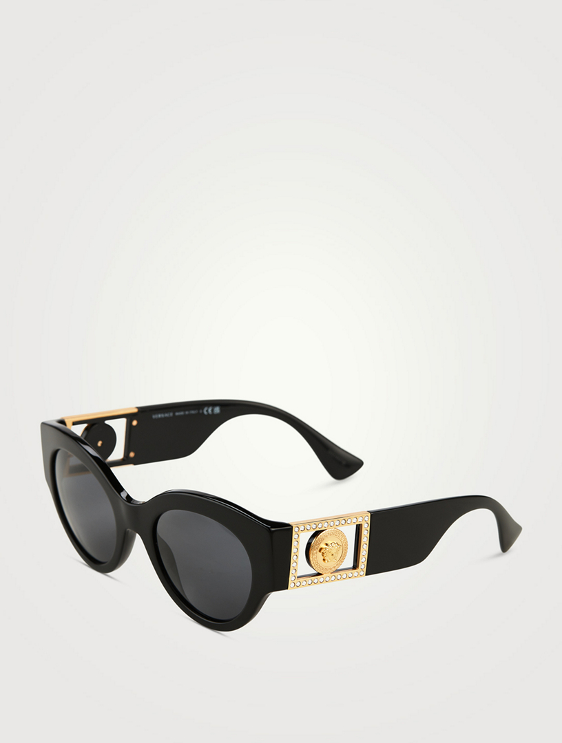 Embellished cat-eye sunglasses in black - Versace