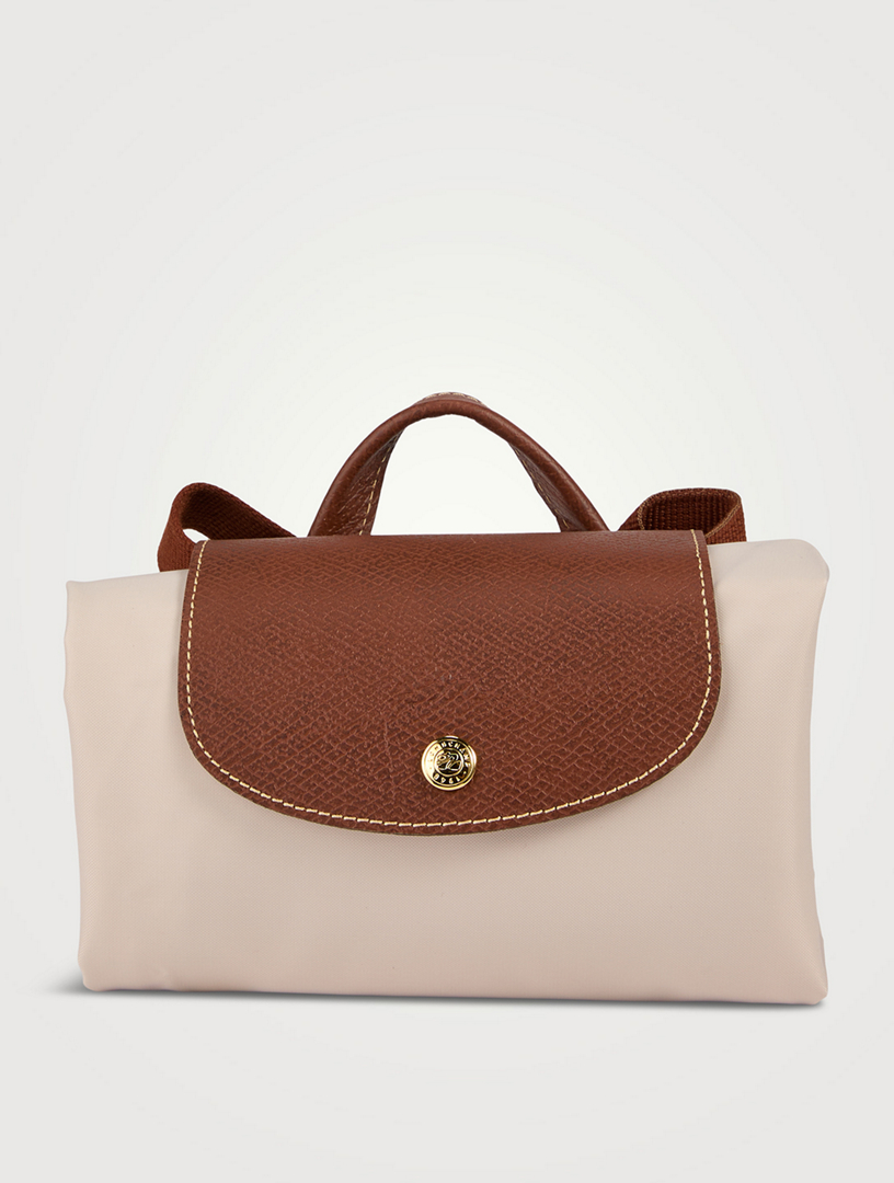 How to fold online a longchamp