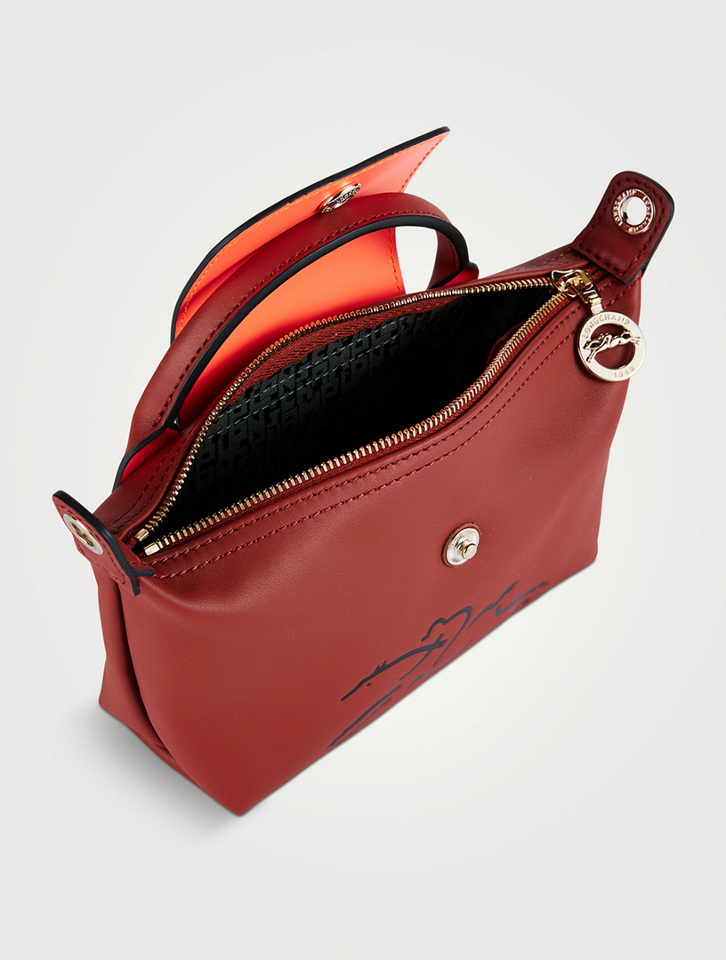 Longchamp pochette hot sale le pliage