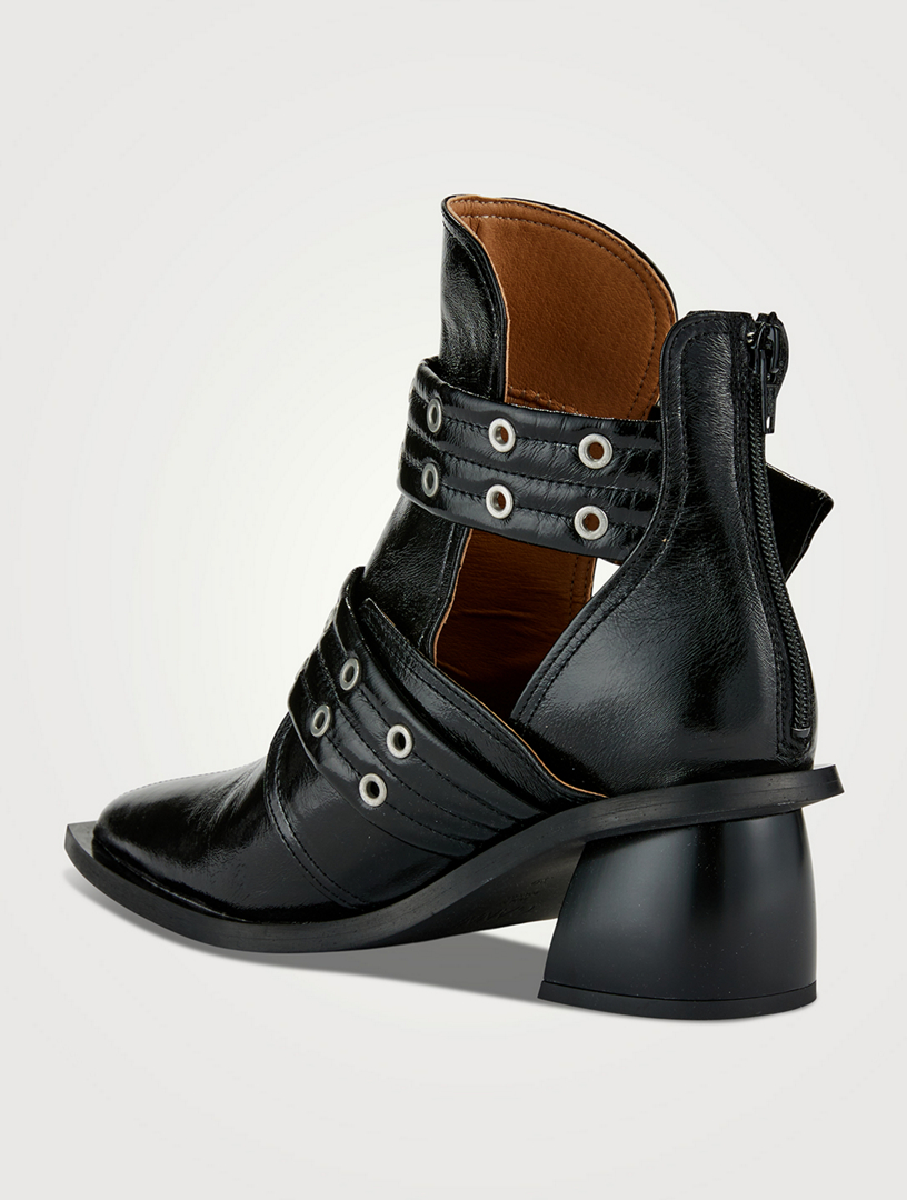 ALEXANDER MCQUEEN Cutout Buckled Leather Ankle Boots in Black