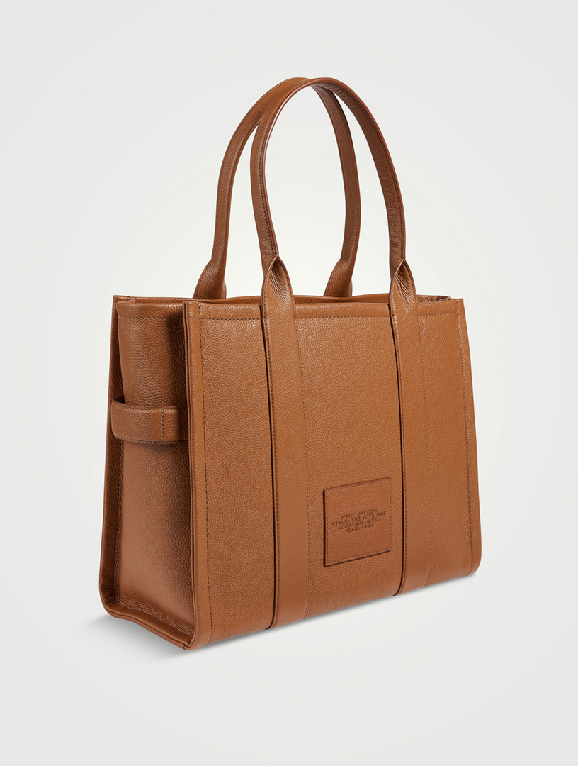 A BROWN, BLUE & BLACK MONOGRAM CANVAS & LEATHER BLOCKS TOTE BAG