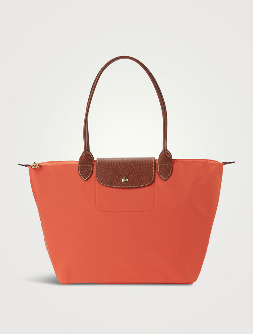 Longchamp triangle outlet bag