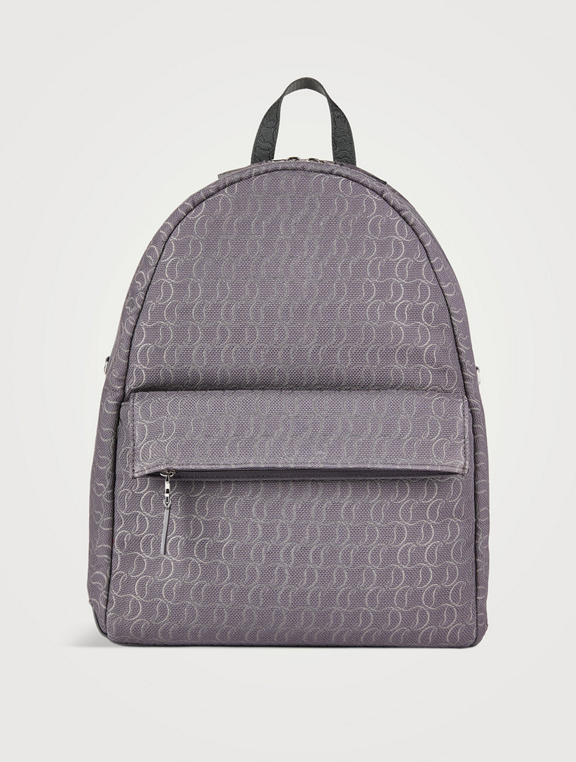 Zip N Flap Jacquard Monogram Backpack