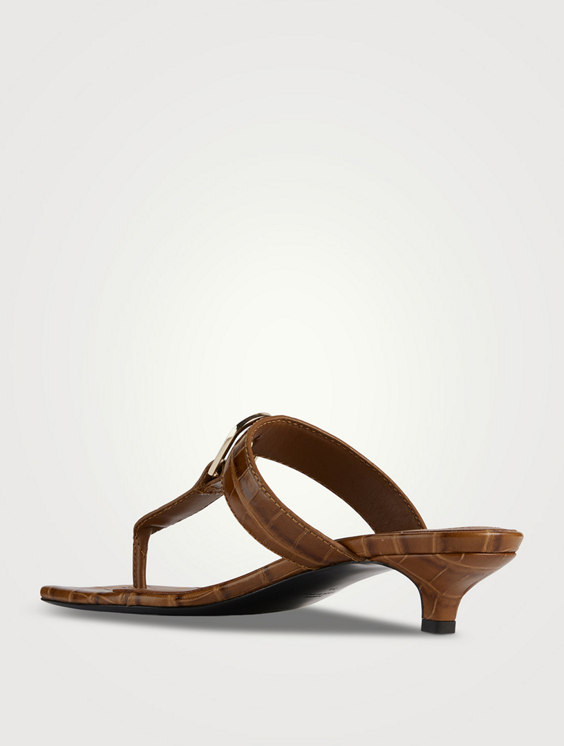 The Belted Croc-Embossed Leather Thong Mules