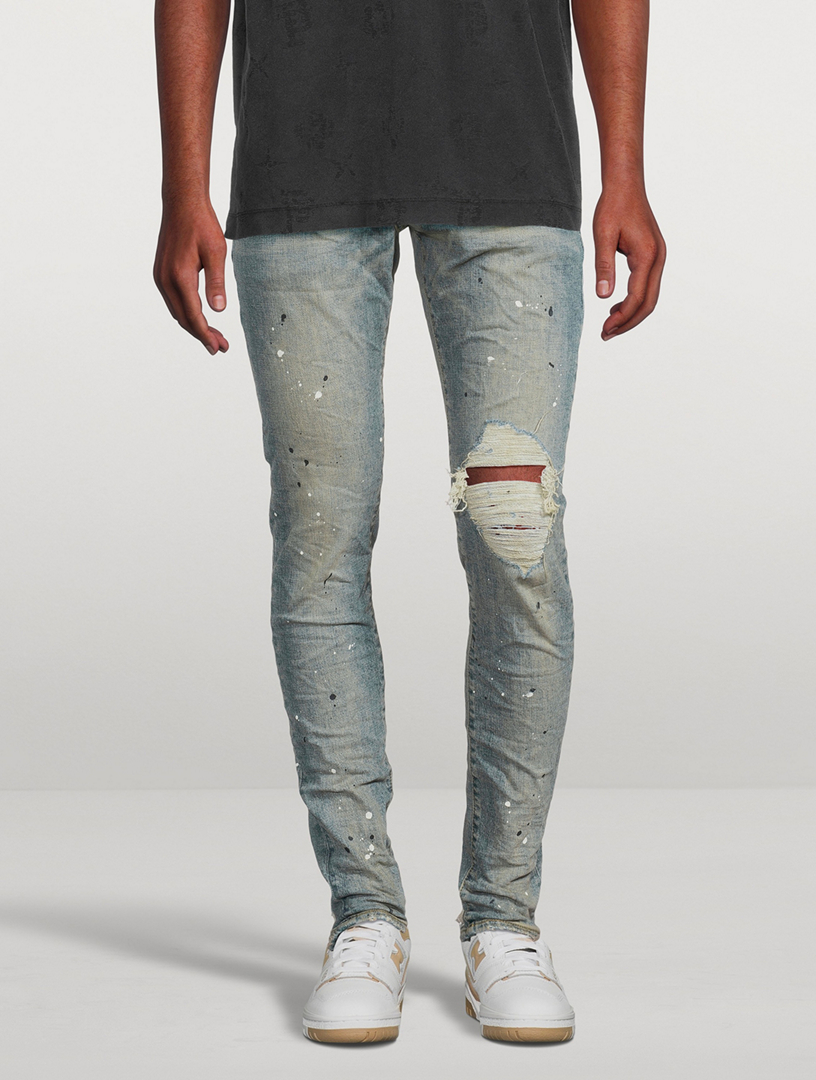 P002 Mid-Rise Slim Jeans
