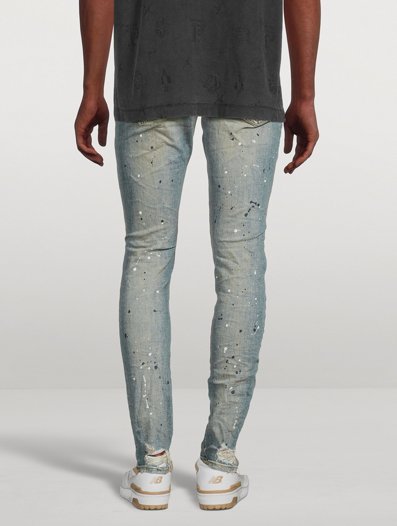 P002 Mid-Rise Slim Jeans
