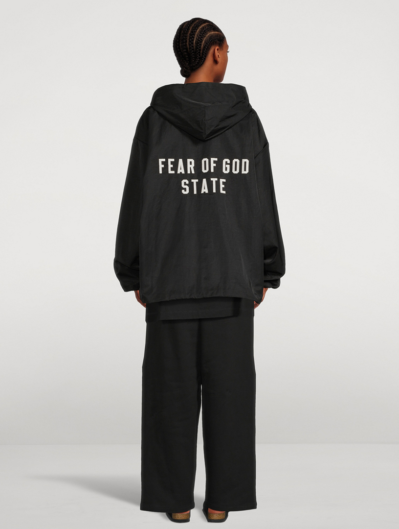 Fear of god essentials coach jacket store