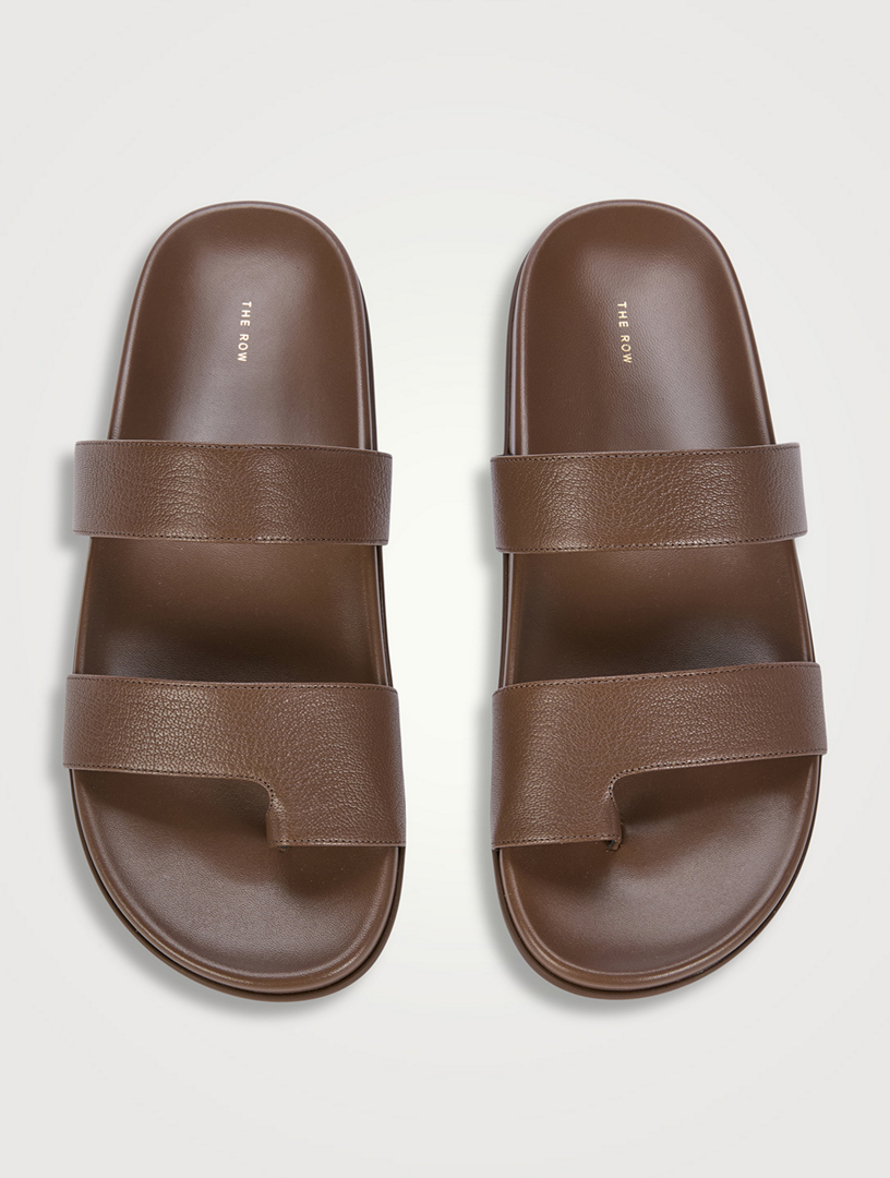 サンダル・ミュール [The Row] Hugh Thin Strap Slide in Leather Hugh Thin Strap Slide Black in Leather – The Row