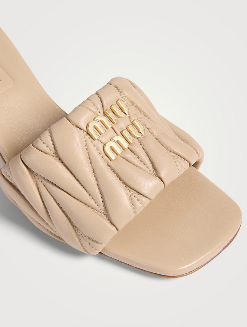 サンダル・ミュール Mon pocket padded leather and nylon mule MIU MIU Matelassé Leather Mules | Holt Renfrew