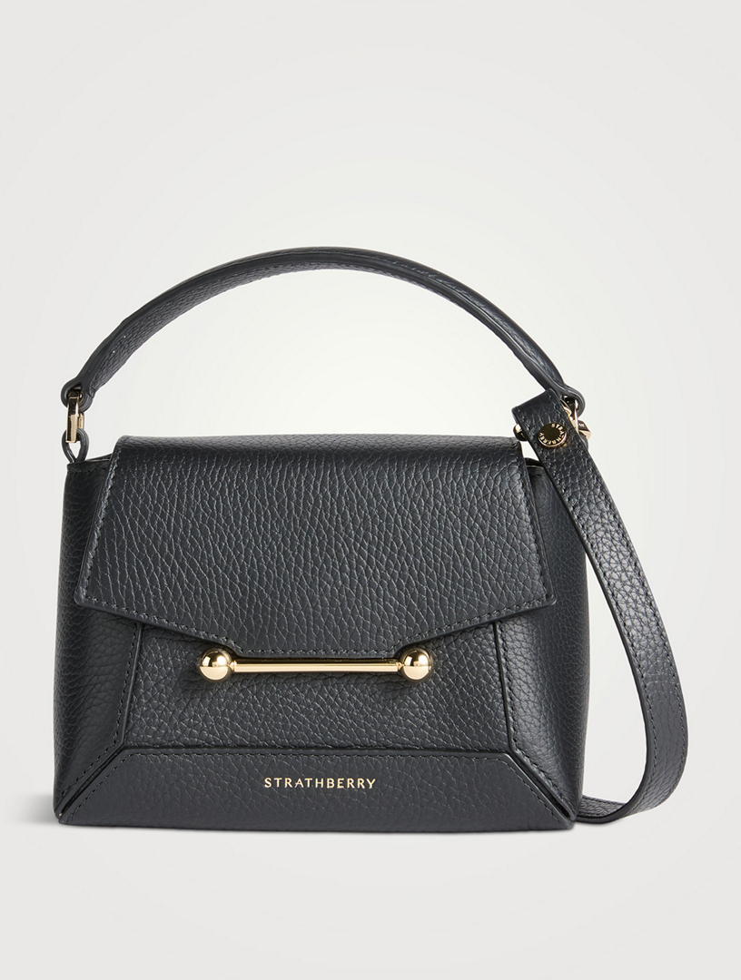 Black top handle designer bag hotsell