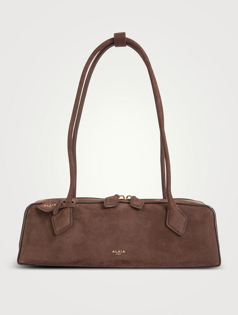 ALAÏA Medium Le Teckel Suede Shoulder Bag | Holt Renfrew
