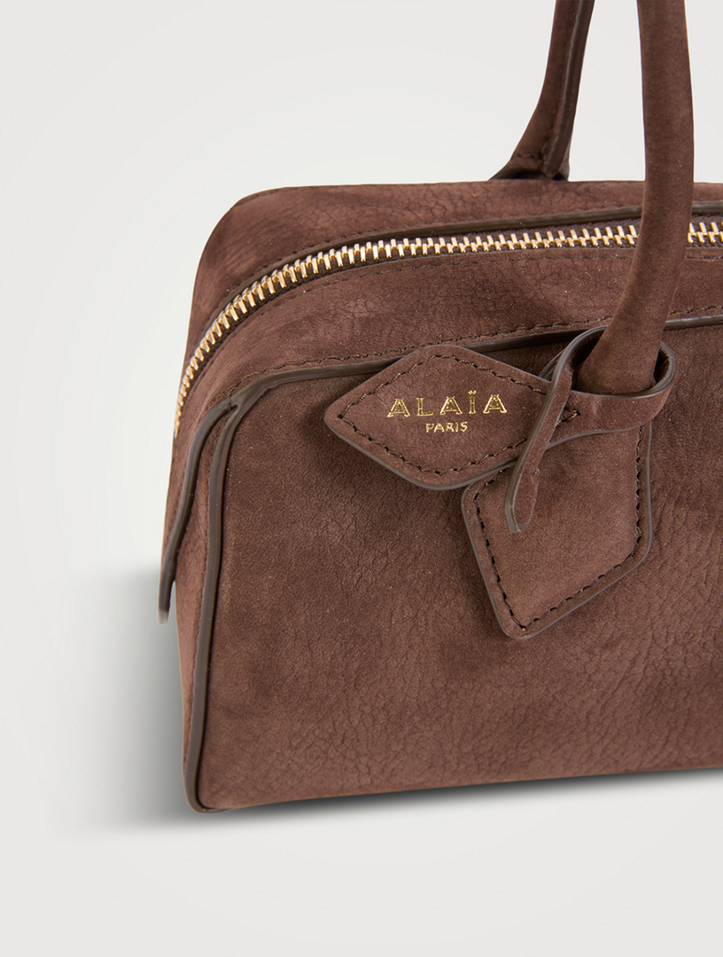 ALAÏA Medium Le Teckel Suede Shoulder Bag | Holt Renfrew