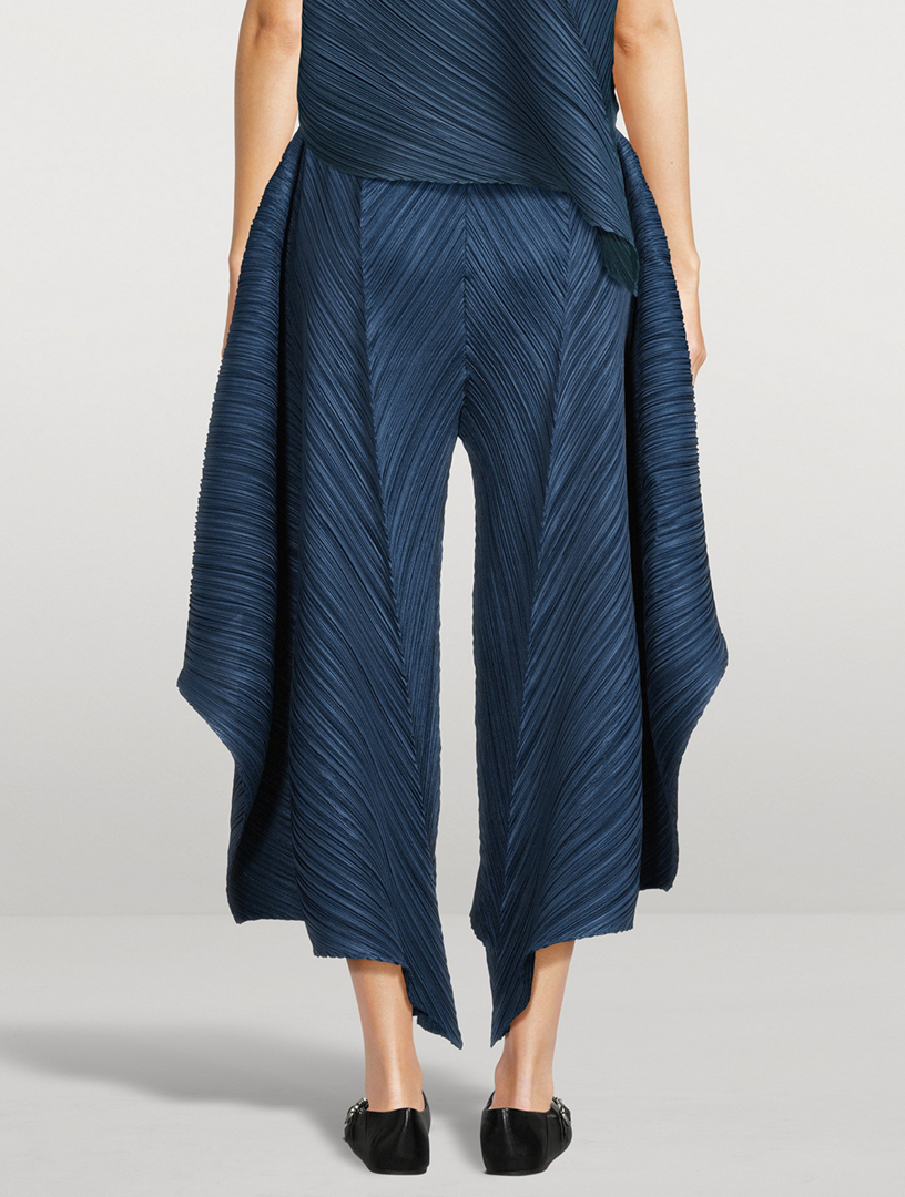 PLEATS PLEASE ISSEY MIYAKE Flare Trousers | Holt Renfrew