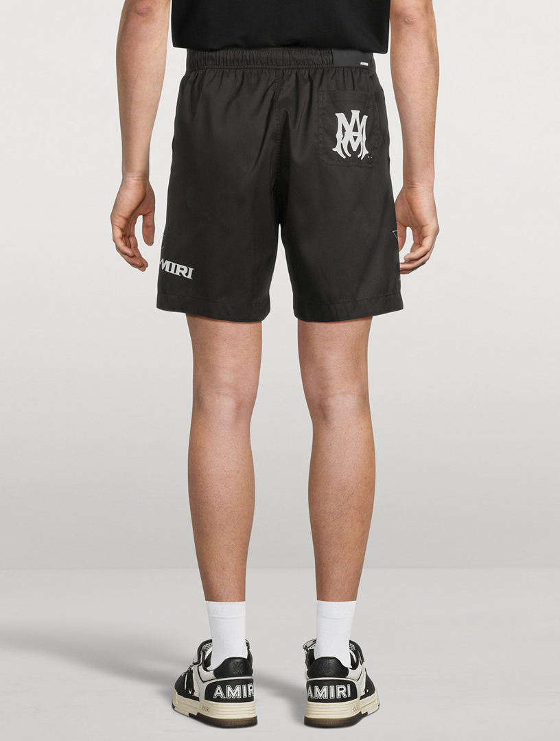 AMIRI Logo Swim Trunks | Holt Renfrew