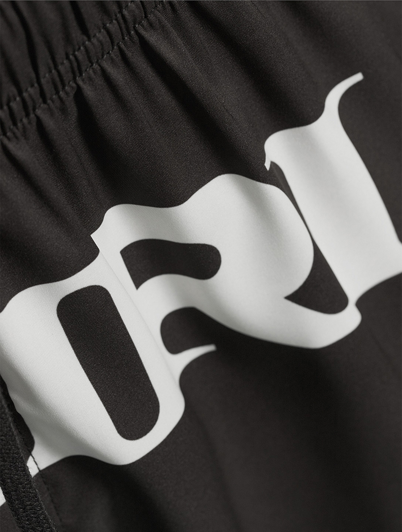 AMIRI Logo Swim Trunks | Holt Renfrew