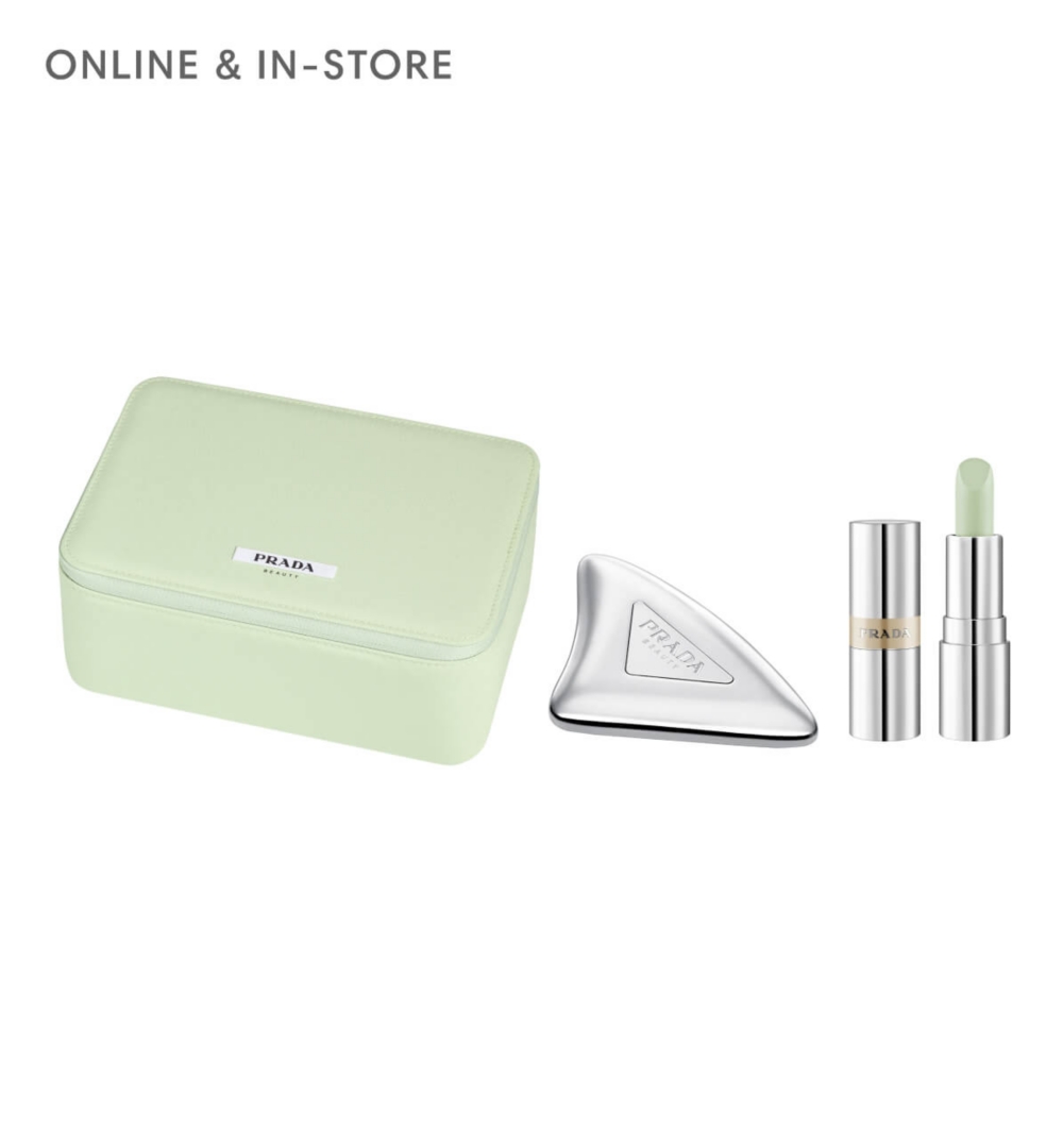 A green pouch and two Prada beauty products