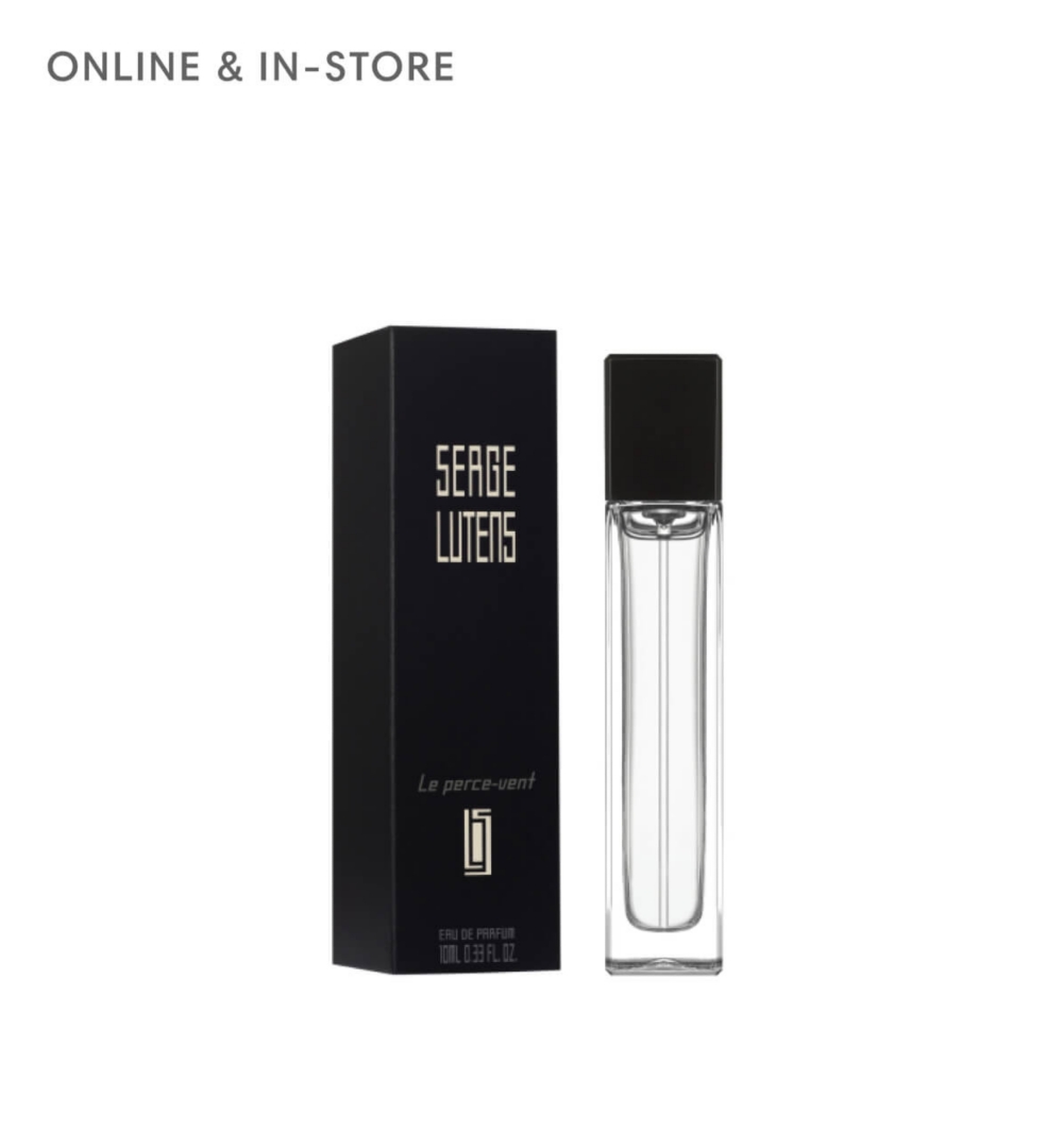 A miniature Serge Lutens perfume bottle