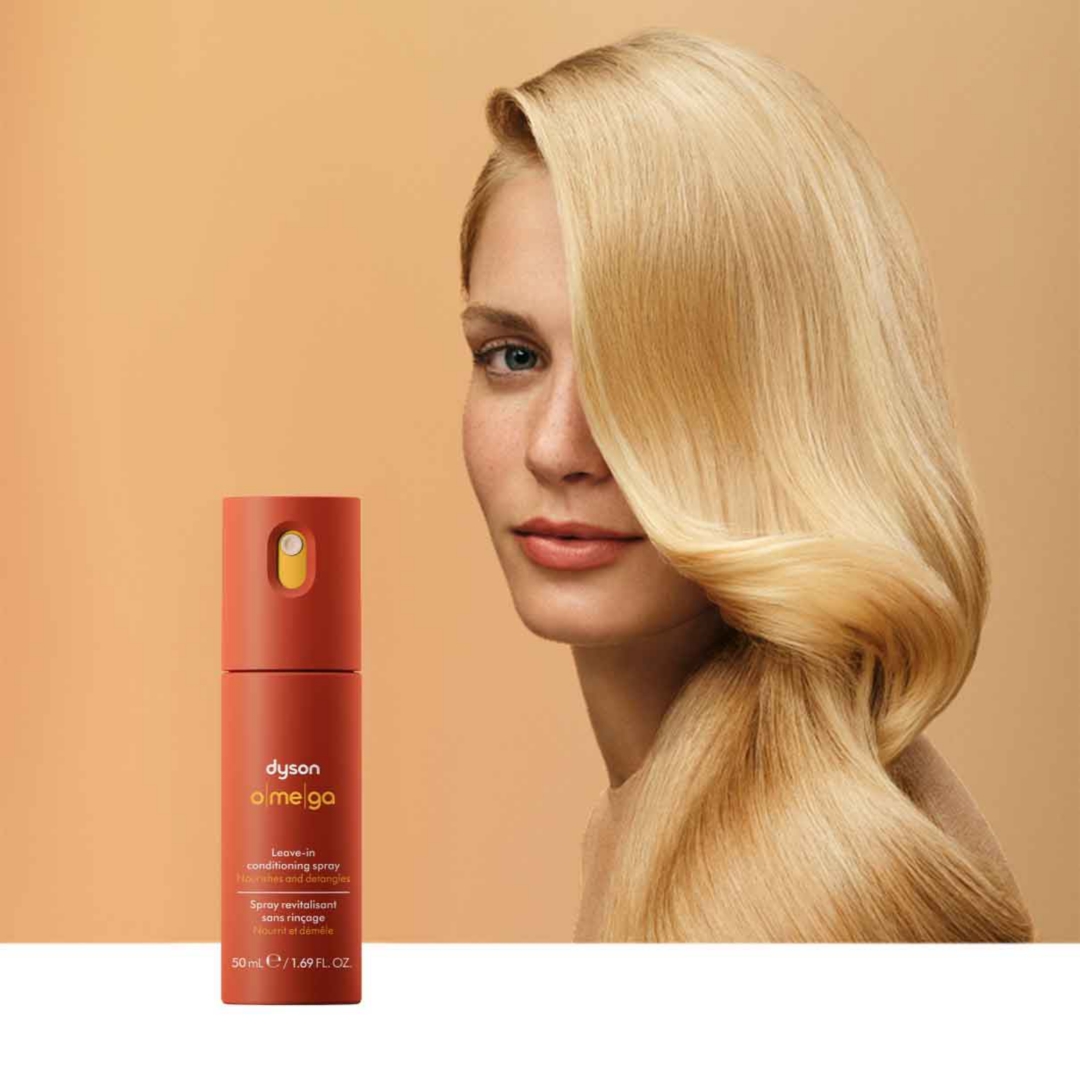 Orange Dyson hair spray bottle