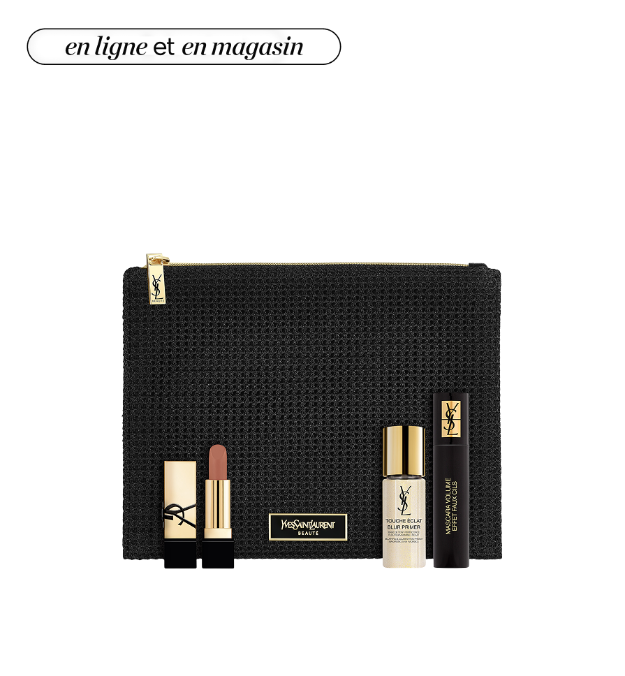 Une pochette entourée de produits de beauté Yves Saint Laurent