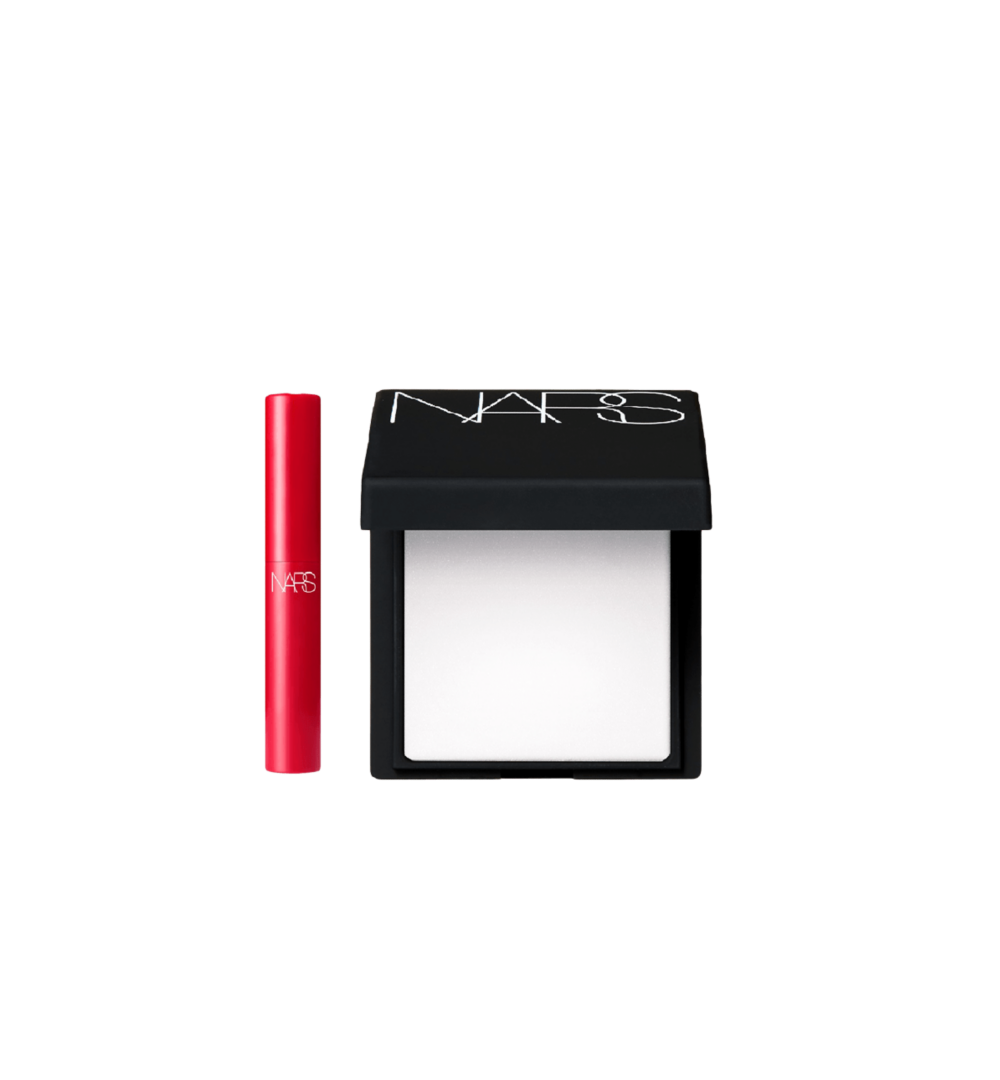 A pouch surrounded by Yves Saint Laurent beauty products
